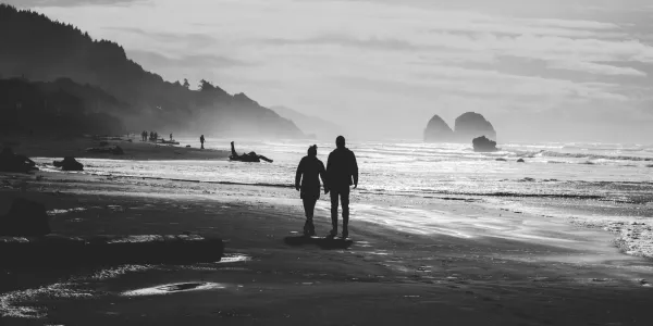 Couple walking on beach